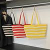 Bolso de mano de alta gama de estilo perezoso, de gran capacidad, para mujer, nuevo, bolso de hombro sencillo con huecos y combinable, bolso de compras moderno.