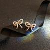 Elegantes pendientes de lazo de hada para mujer, elegantes pendientes de clip de oreja con incrustaciones de diamantes de celebridades de Internet de Corea del Sur sin perforaciones, lujosos pendientes de corazón para niña.