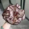Selección PremiumElásticos elegantes y con estilo, nueva colección de accesorios para el cabello de nicho de alta gama para recoger el cabello en la parte posterior de la cabeza