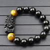 Pulsera valiente de obsidiana natural piedra ojo de tigre pulsera de piedra ojo de tigre hombre obsidiana fábrica directa mayoreo