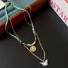 Collar de Mariposa con Cuentas Turquesa Dopamina para Mujer 2025 Nuevo Cadena de Clavícula Apilable Versátil de Alta Gama Tendencia