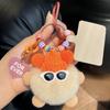 Lindo colgante de bolsa de bola de carbón pequeña de piel de conejo Rex, mochila escolar, muñeco feo, llavero de coche de muñeca de dibujos animados.