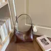 Bolso de mano simple, fresco y elegante para llevar debajo del brazo, nuevo modelo 2026 para el trabajo y los desplazamientos, bolso de hombro cruzado de color liso, moderno, de un solo hombro