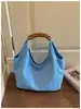 Nova bolsa de lona para o dia a dia, bolsa tote estilosa e casual de nicho, bolsa de mão e bolsa de ombro feminina casual de grande capacidade