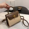 Bolso retro 2025, bandolera Kelly, con textura avanzada, hecho a mano, estilo nicho, para mujer.