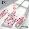 Jinze en stock cuadrado a través rosa barra de cepillo grueso tubo de brillo labial pared gruesa 4.2ml plástico tubo vacío material de embalaje