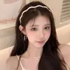 Diadema de lunares finos ondulada estilo coreano para mujer, adecuada para el uso diario, nuevo accesorio para el cabello elegante de moda 2026