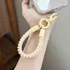 Goma para el pelo de cable de teléfono, cadena para teléfono móvil, cordón de silicona, colgante de teléfono corto de doble extremo, correa antipérdida para teléfono móvil