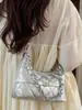 Bolso de Axila de Alta Apariencia a la Moda para Mujer 2026 Nuevo Estilo Chic Relajado Bolso de Hombro Cadena Tipo Dumpling para el Viaje al Trabajo