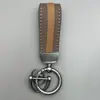 Pingente Chaveiro de Carro Popular da Amazon Chaveiro de Tira Listrada Colorida de Nylon Chaveiro de Carro Masculino e Feminino Presente