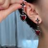 Pendientes de temperamento de cuatro hombres con estrella roja de amor, pendientes de personalidad de nicho femenino, moda 2023, nuevos pendientes de moda.