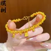 Tienda de Oro Mismo Estilo Pulsera de Candado Pequeño de Burbuja con Incrustaciones de Diamante Chapada en Oro para Mujer, Joyería Nueva de Aleación de Cobre Estilo Chino