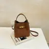 Bolsa de mão pequena feminina para trabalho, nova coleção outono/inverno 2026, estilo retrô, versátil, bolsa de ombro/transversal casual tipo balde