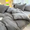 Nuevo juego de cuatro piezas de sábanas y funda de edredón, suave y amigable con la piel, juego de ropa de cama de estilo ins simple para dormitorio y habitación