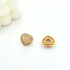 Nuevos Pendientes Retro Pequeños y Ligeros de Lujo con Diseño de Nicho de Saturno con Microincrustaciones de Circonita en Forma de Corazón para Mujer