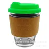 Taza de café de vidrio EK013 con anillo de corcho cubierta de silicona 340ml resistente a altas temperaturas multicolor stock spot logo