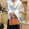 2026 Novo Modelo Mini Bolsa Bowling Shell de Couro Genuíno com Textura de Couro de Cabra, Bolsa Pequena Exquisita para Ombro e Transversal para o Dia a Dia