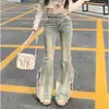 Pantalones vaqueros elásticos de color azul nostálgico para mujer, nueva colección primavera/verano 2026, adelgazantes, de cintura alta, ajustados, versátiles, lavados, ligeramente acampanados