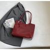 Bolso de mano sencillo y versátil de gran capacidad para mujer, novedad de 2024, bolso de hombro informal de moda, bolso de axila de alta gama.
