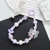 Funda para teléfono móvil color macaron con cordón estilo japonés-coreano Ins hecho a mano con cuentas de flores cadena para teléfono móvil de muñeca lazo