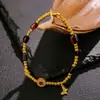 Pulsera tejida a mano estilo Ruyi con carácter de la fortuna púrpura brasileña de ámbar rojo, diseño original DIY, pulsera versátil de nuevo estilo chino