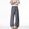 Jeans de trabajo estilo americano para hombre, primavera y otoño, con bolsillos grandes y diseño de patchwork, marca de moda, pantalones casuales holgados de pierna recta ancha