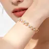 Pulsera de Zirconia con Lazo Micro-engastada Nueva de Verano para Mujer Diseño de Nicho Sensación de Alta Gama Joyería para Mano de Pétalo Simple Versátil