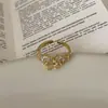 Anel Metálico Aberto de Zircônia de Alto Padrão em Formato de Laço para Mulheres, Luxo Leve, Textura Única, Anel Elegante e Versátil
