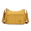 Bolso bandolera moderno y sencillo para mujer, bolso ligero de tela de nailon resistente al agua para ir al trabajo, salidas casuales y viajes.