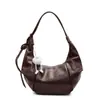 Bolso de Mujer de Gama Alta con Forma de Cuerno 2026 Nuevo Vintage Gran Capacidad Bolso Cruzado de Nicho Bolso Tote de Nicho para el Trabajo