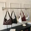 Bolso Tote de Nicho Retro Elegante de Moda para Mujer Modelo Nuevo Primavera 2026 Versátil Elegante Exquisito Bolso de Hombro