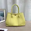 Bolsa Transfronteiriça de Couro Genuíno Bolsa de Mão Versátil Couro Bovino de Camada Superior Togo Bolsa de Trabalho para o Dia a Dia Bolsa Feminina Transversal Casual Versátil
