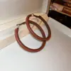 Pendientes Retro Europeos y Americanos de Otoño e Invierno con Estampado Geométrico de Leopardo en Piel Lujo Accesible Pendientes de Gama Alta Pendientes de Moda Elegantes y con Estilo para Mujer