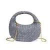 2025 Venta al por mayor de fábrica Bolso esmerilado de moda nuevo Bolso tejido a mano Tendencia Otoño e Invierno Bolso cruzado de lujo ligero para mujer