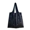 Bolsa de compras mediana a rayas con estampado de cuadros, plegable, ecológica, de nailon, estilo momia, coreana