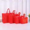 Bolsa de TNT Guochao Guofeng Personalizada Laminación por Termopresión Impermeable Bolsa de Regalo para Compras Bolsa con Carácter Fu de Año Nuevo