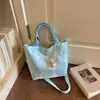 Bolso de mujer suave y liso de alta calidad, nuevo modelo 2026, bolso tote de gran capacidad para el trabajo diario, bolso de hombro versátil para comercio exterior