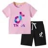 Nueva Camiseta de Verano 2026 para Niños Ropa Infantil de Comercio Exterior Estilo Coreano Ins Algodón Manga Corta y Pantalones Cortos Conjunto de Dos Piezas para Niños