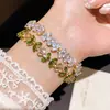 Pulsera de flor ovalada de circón con un diseño de nicho, estilo fresco y natural, versátil y lujosa, un accesorio de joyería fina para mujer