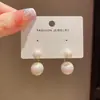 Un Par de Pendientes de Perla con un Diseño Único, Suaves y Versátiles, Modernos y Sencillos, con Sentido del Diseño, al por Mayor