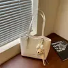 Bolso de hombro grande minimalista transfronterizo para mujer, nuevo bolso de moda 2026 para estudiante universitario, bolso tote de gran capacidad para verano