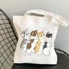 Bolsa de lona con estampado de gato de dibujos animados, linda bolsa de hombro para estudiante, casual, comercio exterior global, bolsa de compras portátil