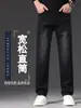 Jeans rectos de alta gama para hombre, nuevo estilo 2026, corte holgado, acabado lavado, elásticos, casual, pantalones de otoño, modernos y versátiles para hombre