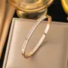Pulsera Transfronteriza de Acero de Titanio para Mujer con Diamantes Que No Se Desvanece, Zirconia Chapada en Oro Real, de Alta Gama, Simple y Versátil Pulsera de Acero Inoxidable