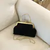 El Bolso de Concha de Moda de Este Año 2025 Otoño e Invierno Nuevo Bolso de Cadena Bolso de Mano de Nicho con Estampado de Leopardo Bolso de Hombro Cruzado para Mujer