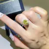 Anillo de moissanita diamante ovalado amarillo al por mayor forma especial europeo y americano anillo huevo de paloma diamante de color anillo de propuesta nuevo mujer