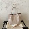 Bolso de gamuza para mujer, nuevo modelo de otoño 2026, bolso de hombro Maillard de alta gama para el día a día, bolso tote de gran capacidad