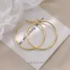 Pendientes Largos Dorados de Plata Pura S999 para Mujer, Estilo de Lujo Ligero de Nicho de Alta Gama, Pendientes de Aro Inspirados en Celebridades, Pendientes Versátiles y Elegantes