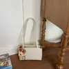 Bolsa de Ombro Simples Versátil Transfronteiriça para Mulheres, Nova Tendência Verão 2026 Estilo Coreano Ins Super Popular Bolsa de Trabalho Bolsa de Braço