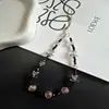 Nova Corrente de Celular Lanyard de Cristal Rosa e Preto em Formato de Coração Estilo Curto Acessório de Câmera CCD de Nicho